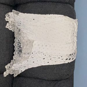 Cream tank top with holes and lace bottom
